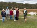 group next to dam